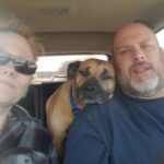 man leaves car door open at gas station stray dog sneaks in the car and asks to be adopted